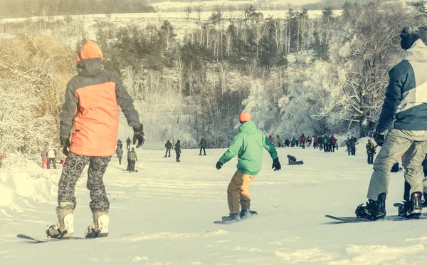 People on snowboards — Stock Photo, Image