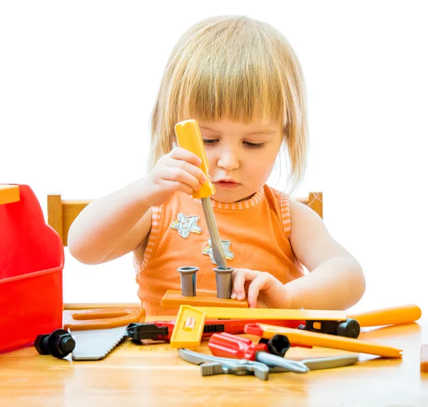 Criança com ferramentas de brinquedo — Fotografia de Stock