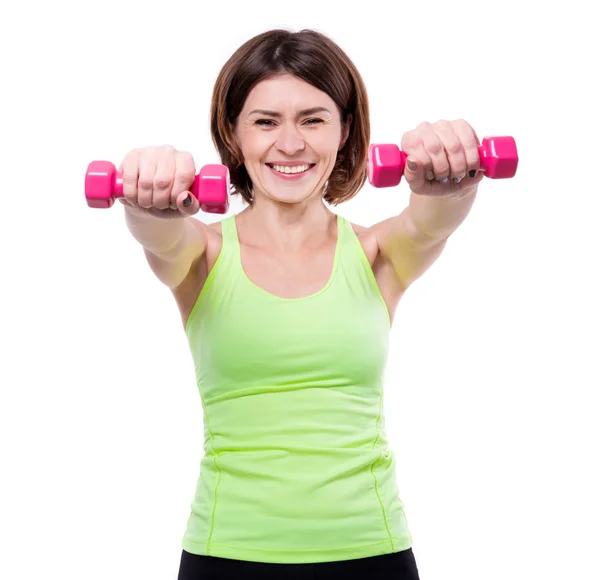 Sonriente deporte chica entrenamiento con mancuernas — Foto de Stock