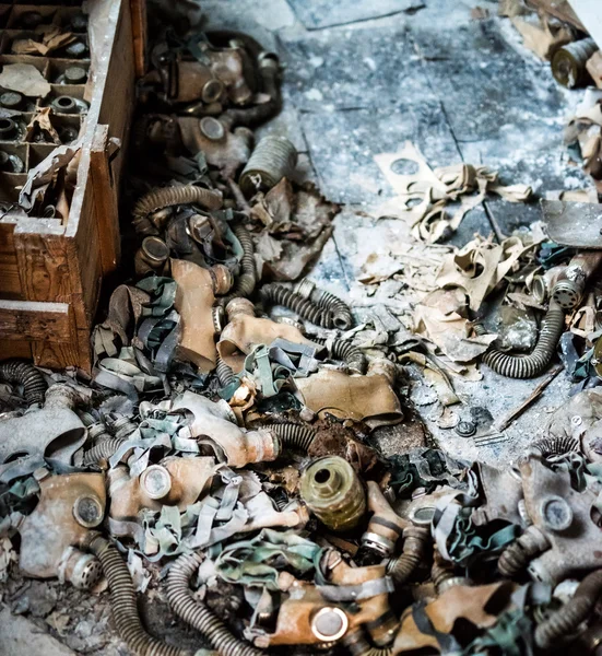 school room with trash and masks on the floor in Pripyat