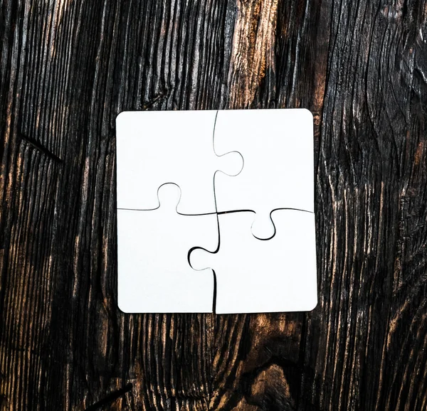 Quattro pezzi di puzzle collegati — Foto Stock