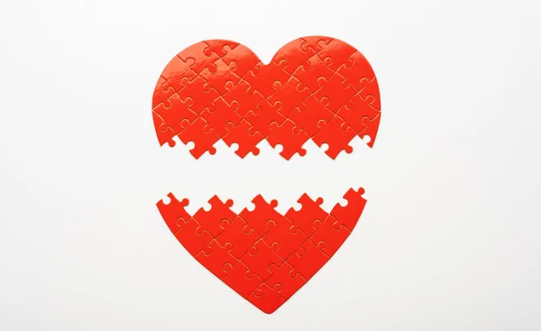 Unconnected parts of heart shaped puzzle — Stock Photo, Image