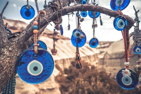 Amulets against evil eye on tree — Stock Photo, Image