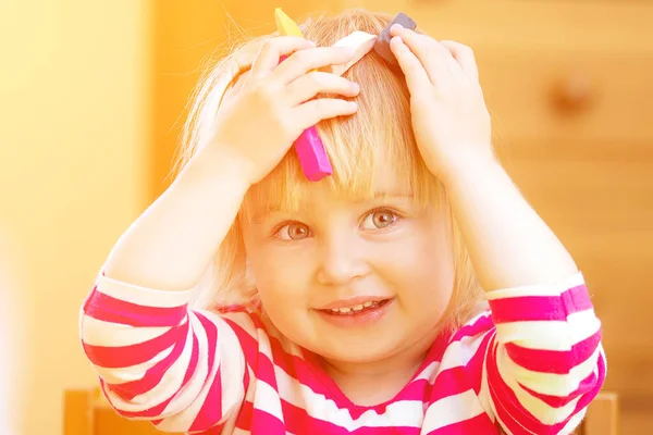 Little girl playing with plasticine — Stock Photo, Image