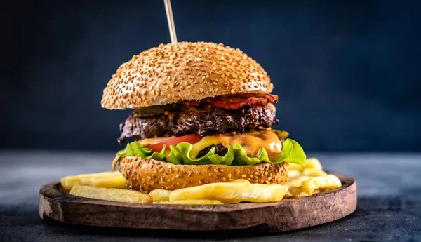 Delicious burger with meat and cheese — Stock Photo, Image