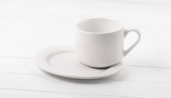 A csésze tányéron áll — Stock Fotó