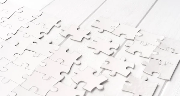 Pieces of jigsaw puzzle — Stock Photo, Image