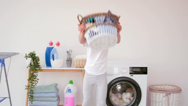 Girl is playing during laundry — Stock Video