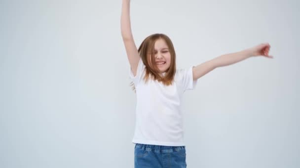 Cheerful little girl showing great joy — Stock video