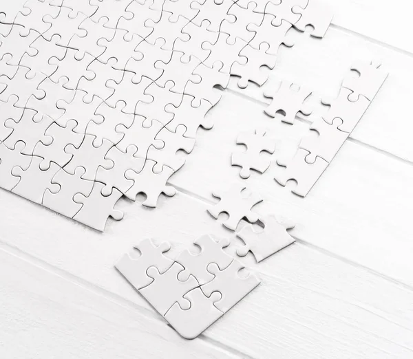 Matching pieces of puzzle — Stock Photo, Image