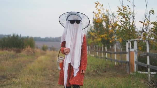 Little girl walking to halloween party — Stock Video