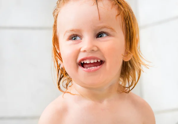 Baby in bathroom Stock Image