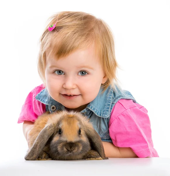 Baby with rabbit — Stockfoto