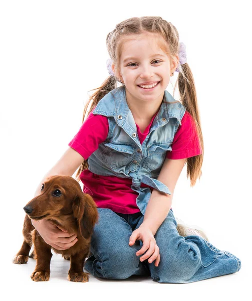 Dachshund ile küçük kız — Stok fotoğraf