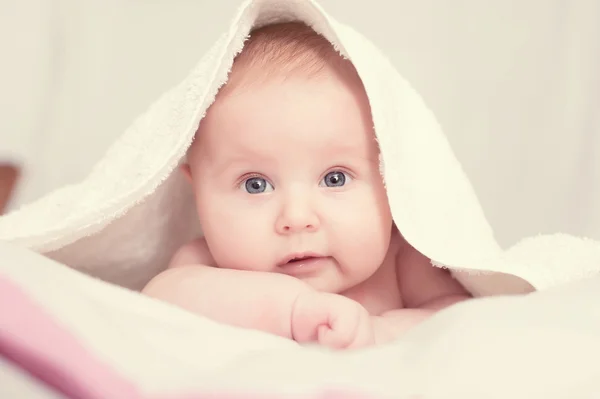 Baby with towel — Stock Photo, Image