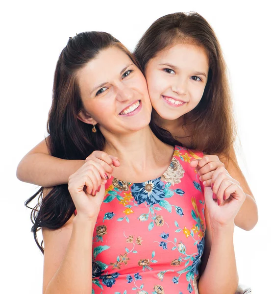 Little girl hugging her mother — Stock Photo, Image