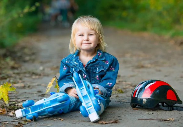 Little girl on roller skates — Stock Photo, Image