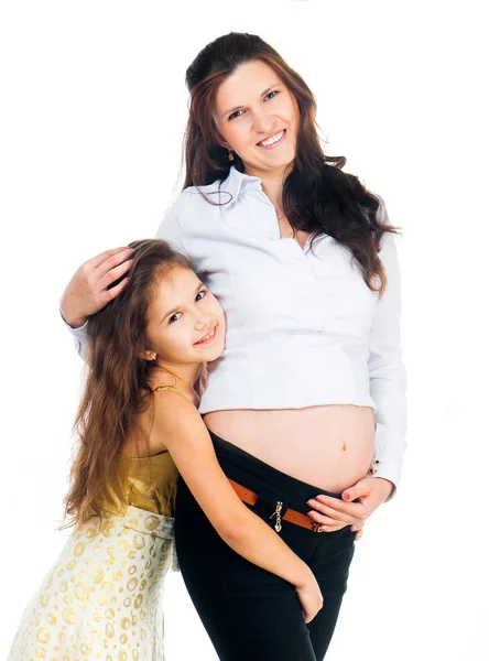 Little girl and her pregnant mother — Stock Photo, Image