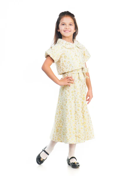 Cute little girl in a light dress — Stock Photo, Image