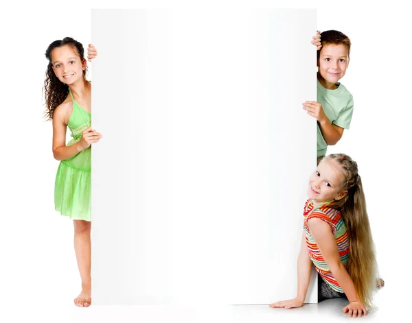 Kids with white banner — Stock Photo, Image