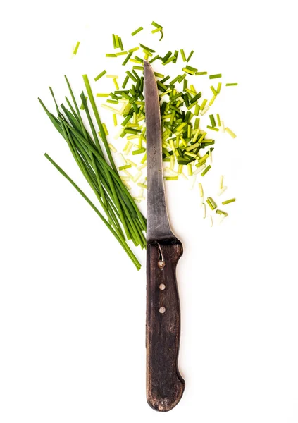 Kitchen knife and green onions — Stock Photo, Image