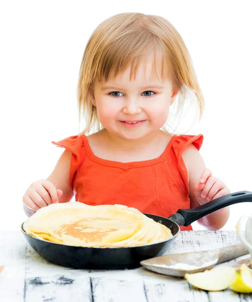 Baby girl with pancakes — Stock Photo, Image