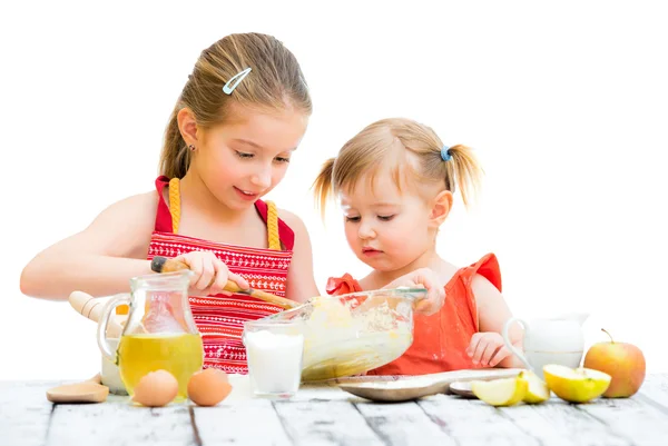 Sisters cooking — Stock Photo, Image