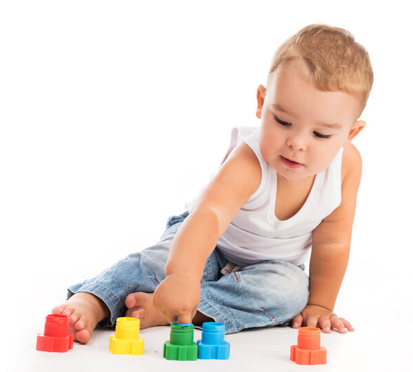 little boy playing with gouache