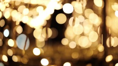 Parlak Altın Çelenk Soyut bir Yeni Yıl Bokeh Geçmişi Yarattı ve Noel 'i anımsattı