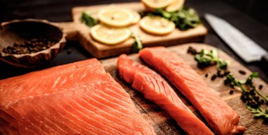 fillet of salmon red fish with herbs and lemon ready for cooking healthy dinner