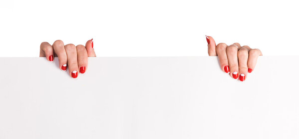 hands holding big blank paper