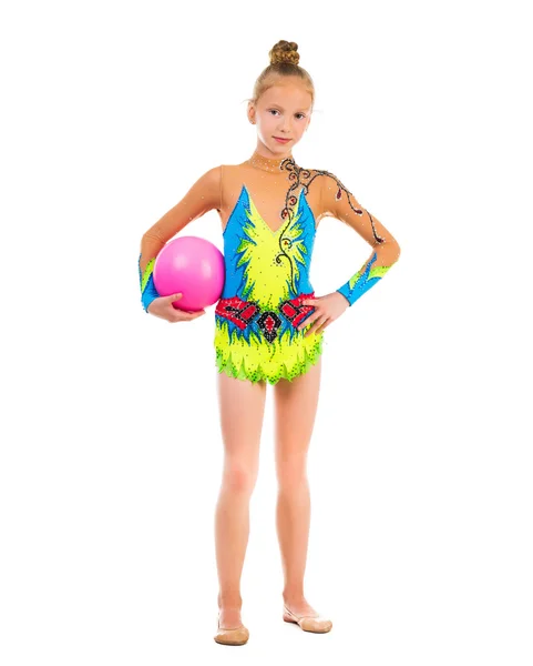 Little gymnast doing an exercise with ball — Stock Photo, Image