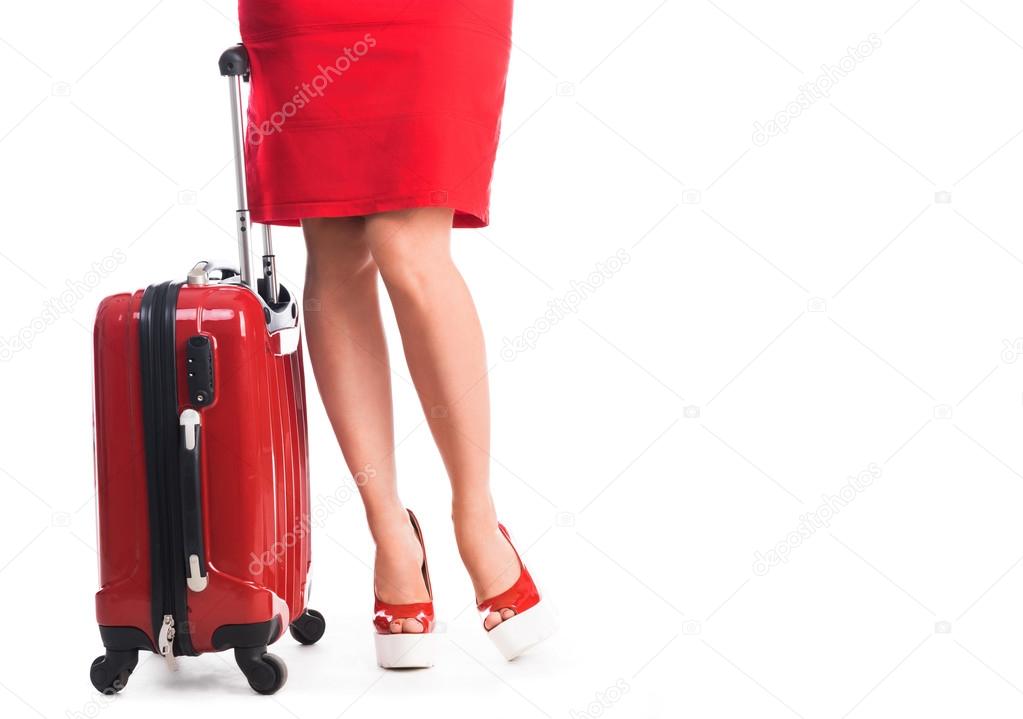 suitcase and legs of girl