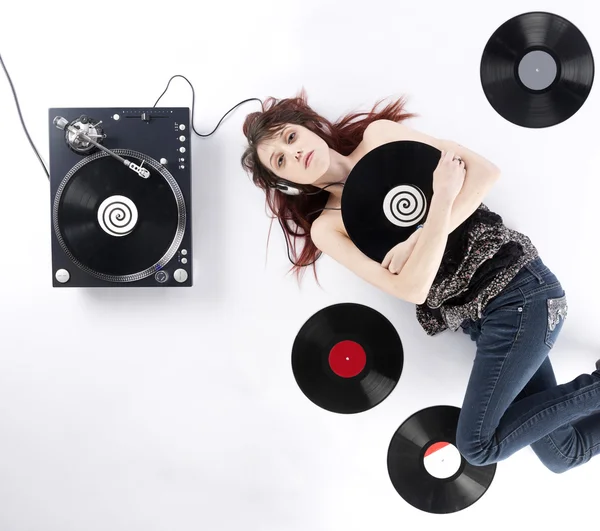 Lying Woman with Vinyl Turnaround and Records — Stock Photo, Image