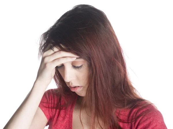 Young Woman with Headache Holding her Forehead Stock Picture