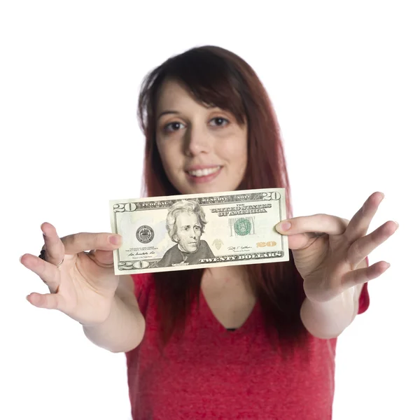 Mujer joven feliz mostrando billete de 20 dólares estadounidenses — Foto de Stock