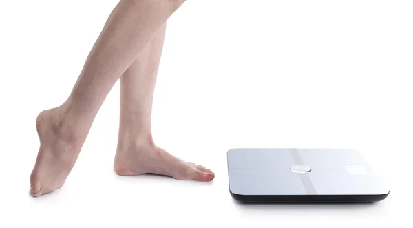 Bare Feet of a Woman Beside Body Analyzer Device — Stock Photo, Image