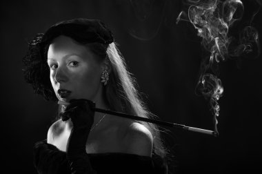 Glamorous 1940s Film Noir Woman Smoking Cigarette