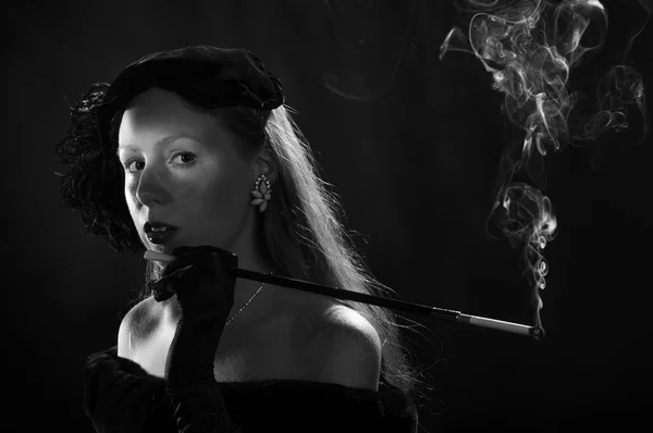 Glamorous 1940s Film Noir Woman Smoking Cigarette — Stockfoto