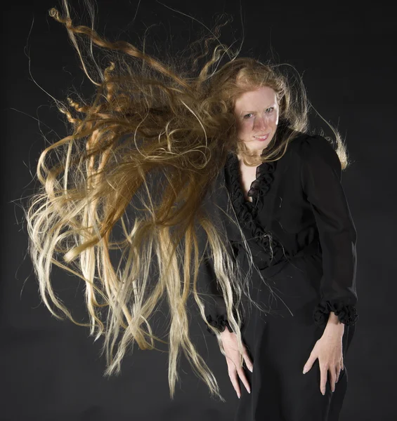 Blond Woman with Wind Blowing Through Long Hair — Stock Fotó