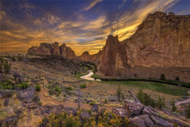 Road and River Through Valley During Golden Sunset
