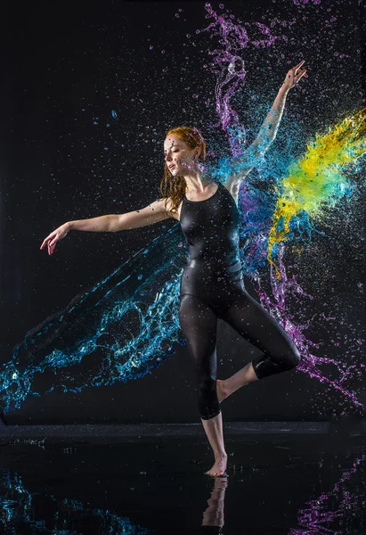 Female Dancer Being Splashed with Colorful Water — 图库照片