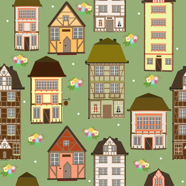 Seamless pattern of houses — Stock Vector