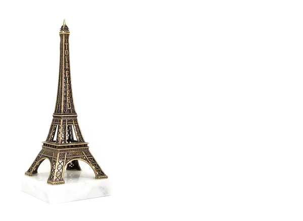 Suvenýr z pařížské Eiffelovky. Kopírovat prostor. Izolované na bílém pozadí. Cestovní koncept — Stock fotografie