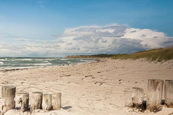 Poles on the beach — Stock Photo, Image
