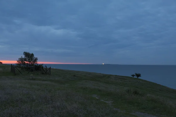 Lighthouse at horizon — Stock Photo, Image