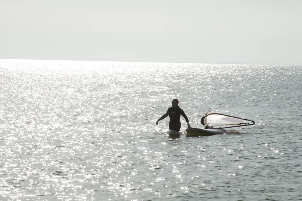 Surfer on foot — Stock Photo, Image