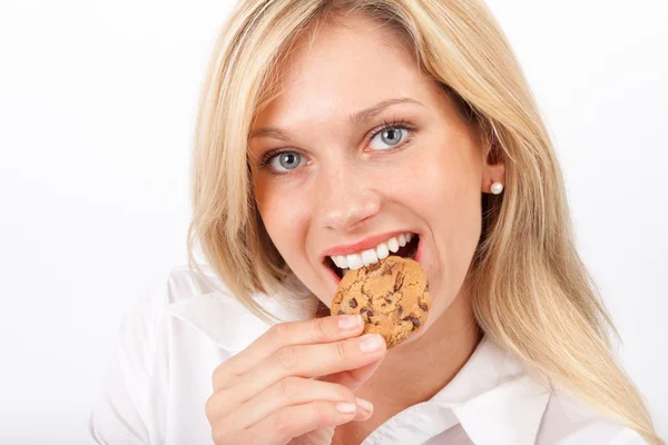 Eve nibbles biscuit — Stock Photo, Image