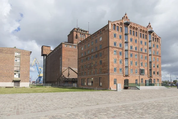 Square with harbor warehouse — Stock Photo, Image