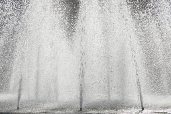 Water fountains in back lignt